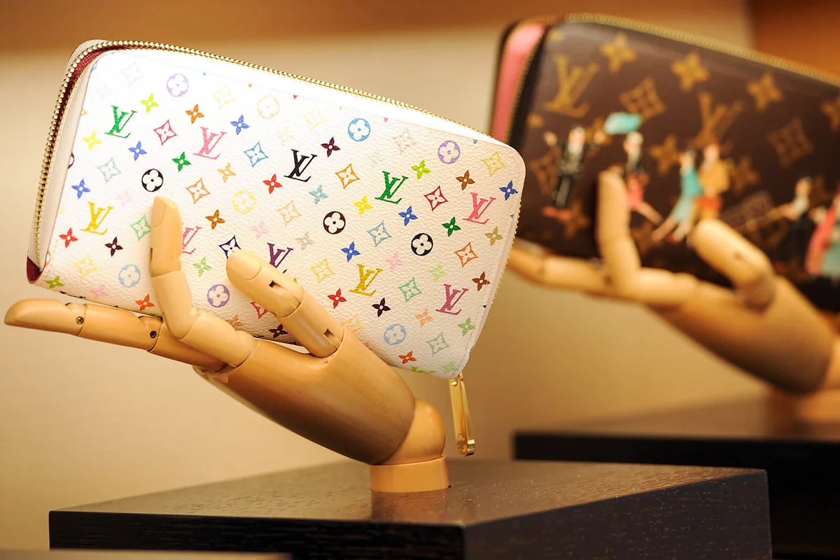 Handbags are displayed in a Louis Vuitton shop | Getty Editorial Use