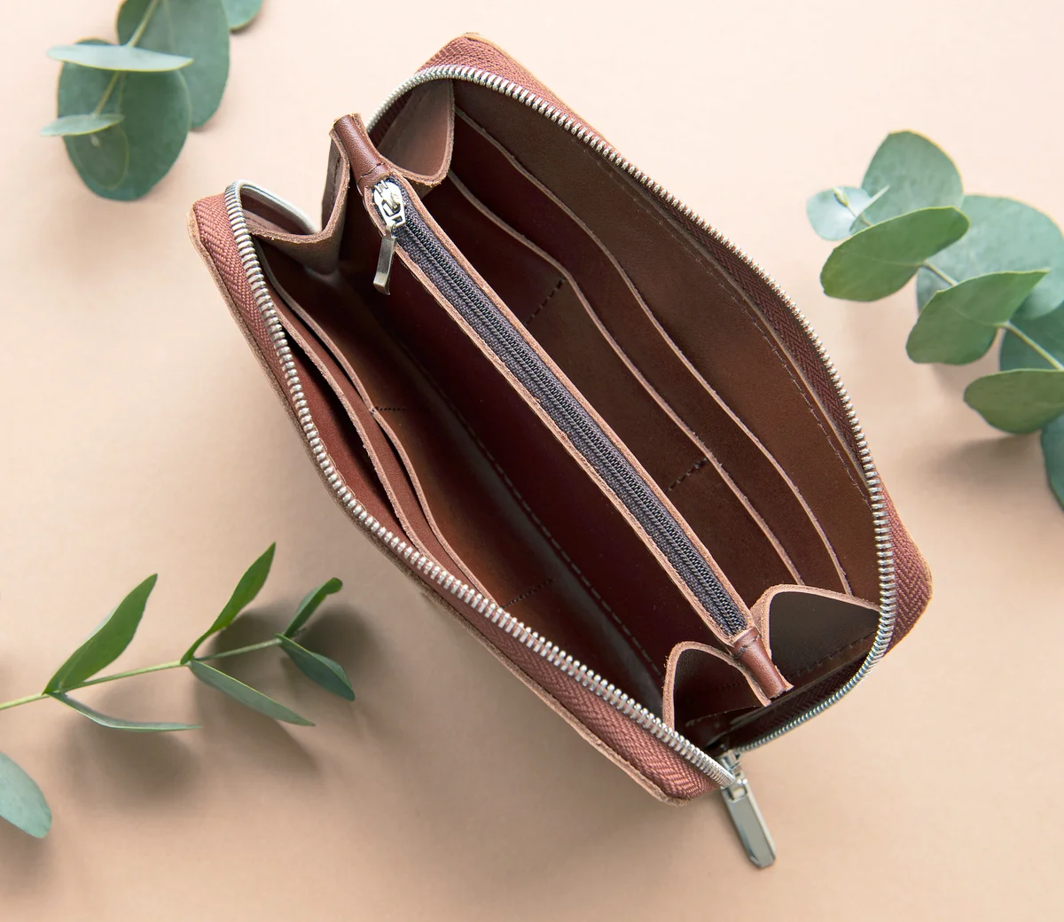 Opened brown leather purse