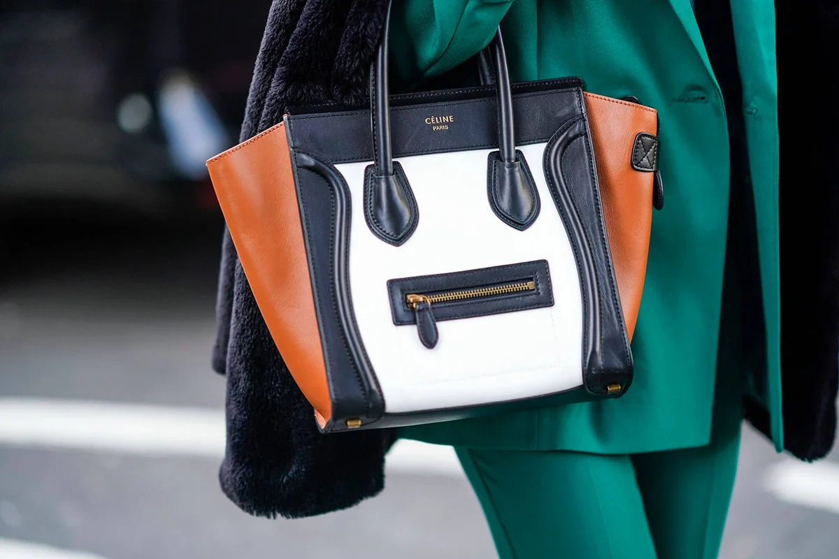 guest wears a Celine bag | Getty Editorial Use