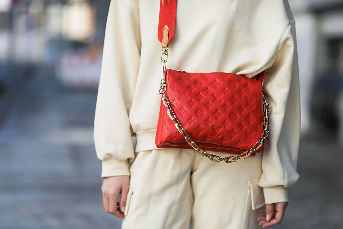 Sonia Lyson wearing Louis Vuitton Coussin red bag | Getty Editorial Use