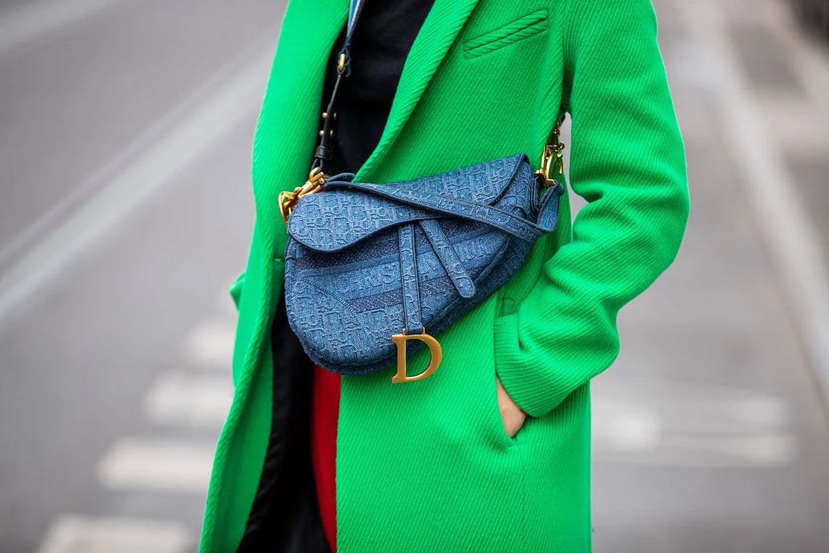 denim saddle bag and strap Dior | Getty Editorial Use