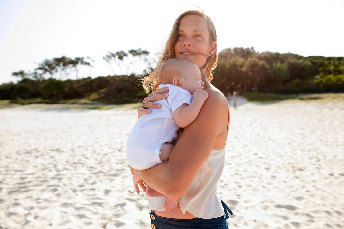 Mother holding newborn baby