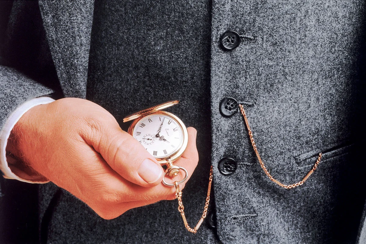 Man checking his pocket watch