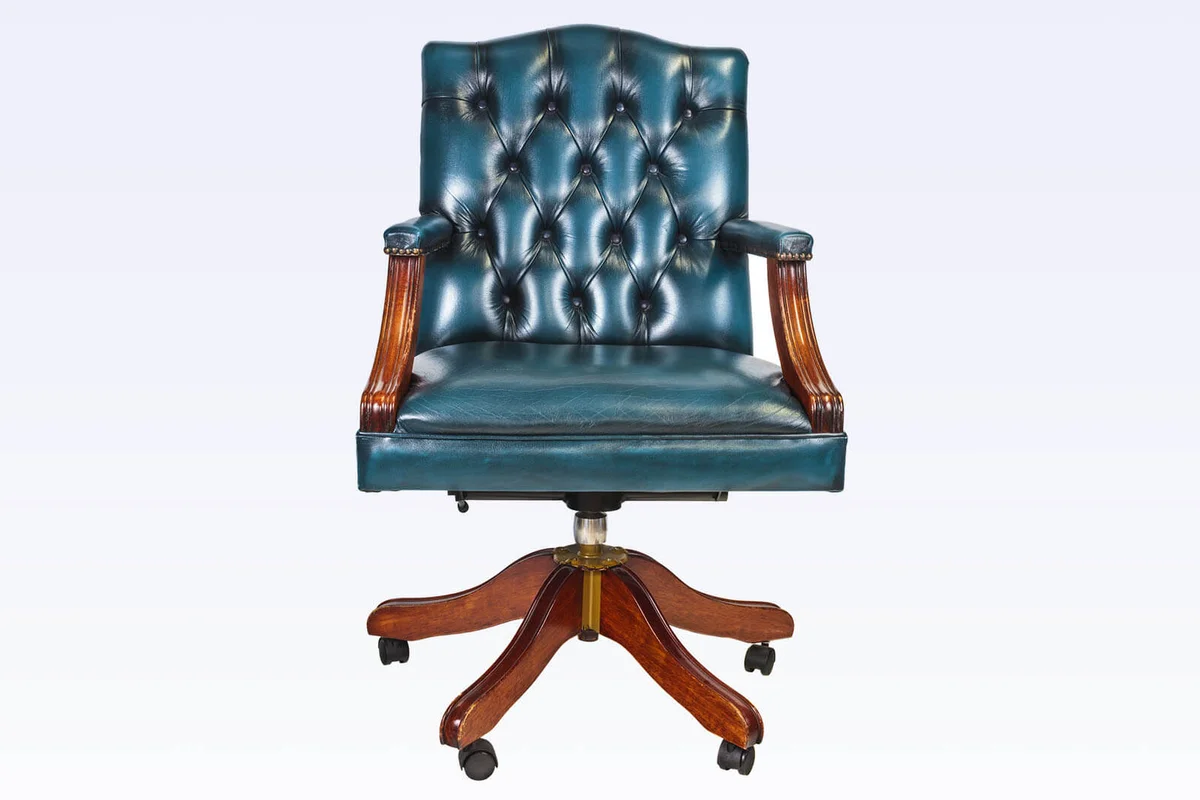 Office chair with buttoned leather isolated on white