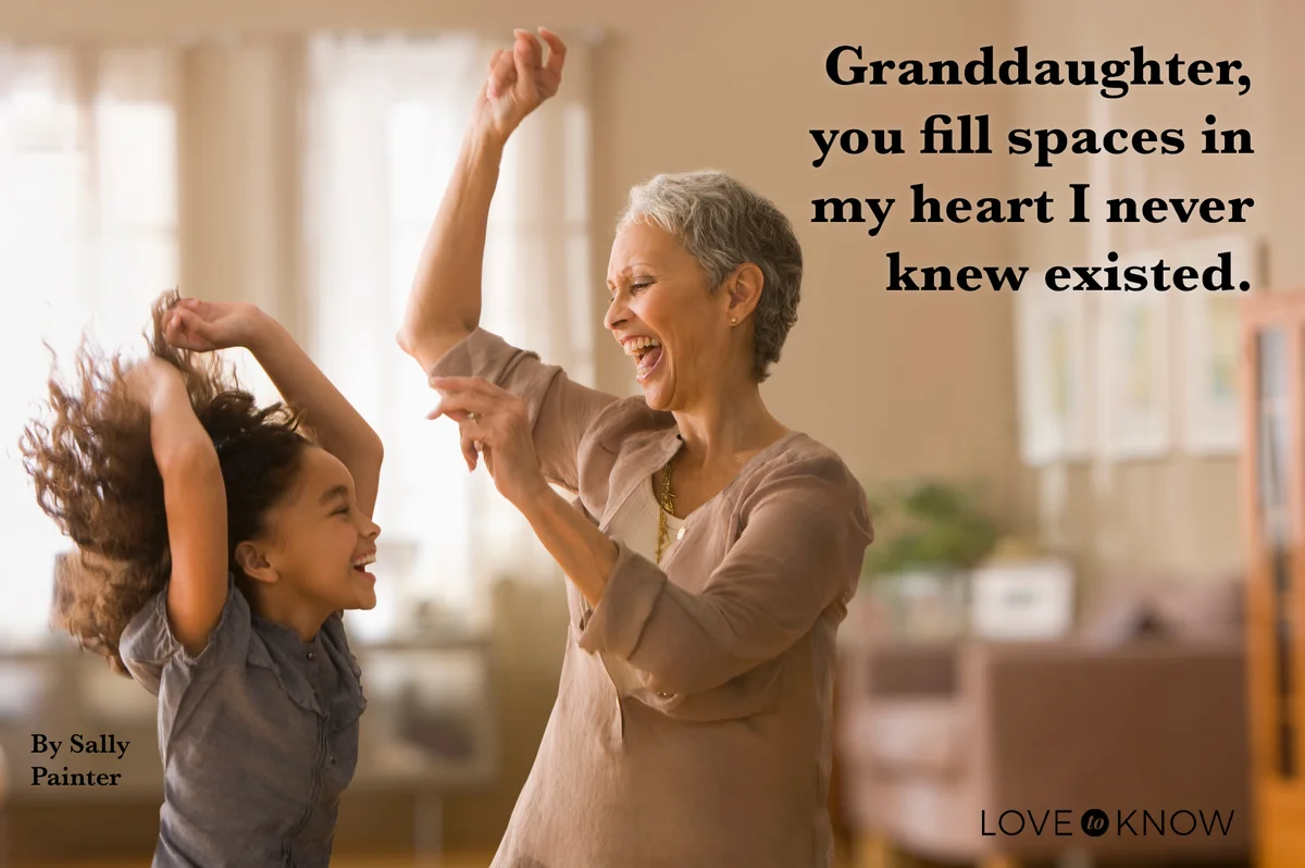 Grandmother and granddaughter dancing together