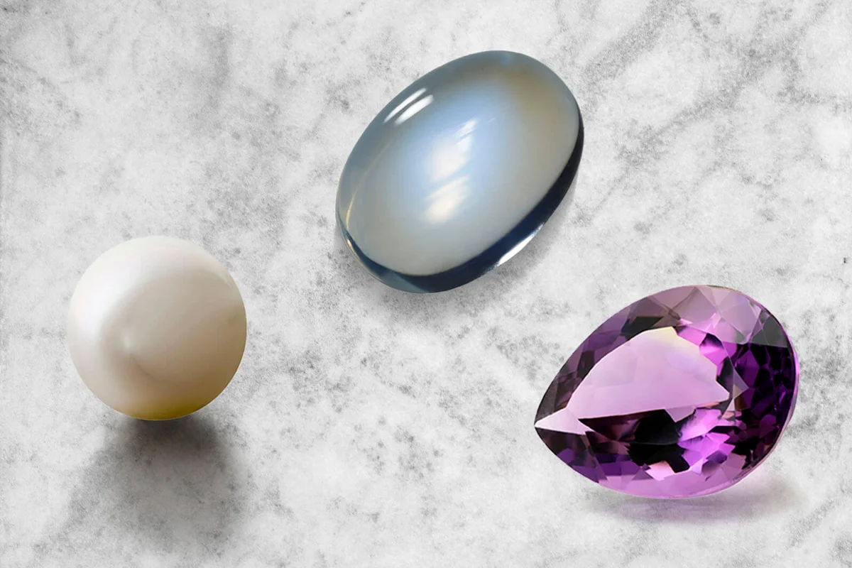 Marble wall texture with June Birthstones glowing