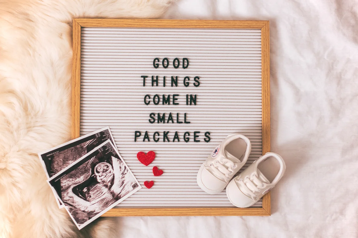 Baby clothes with ultrasound picture of the baby