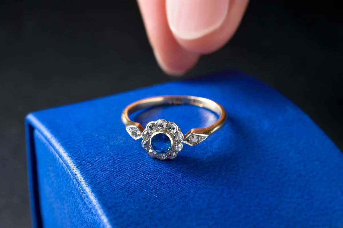 reaching for a sapphire & diamond ring