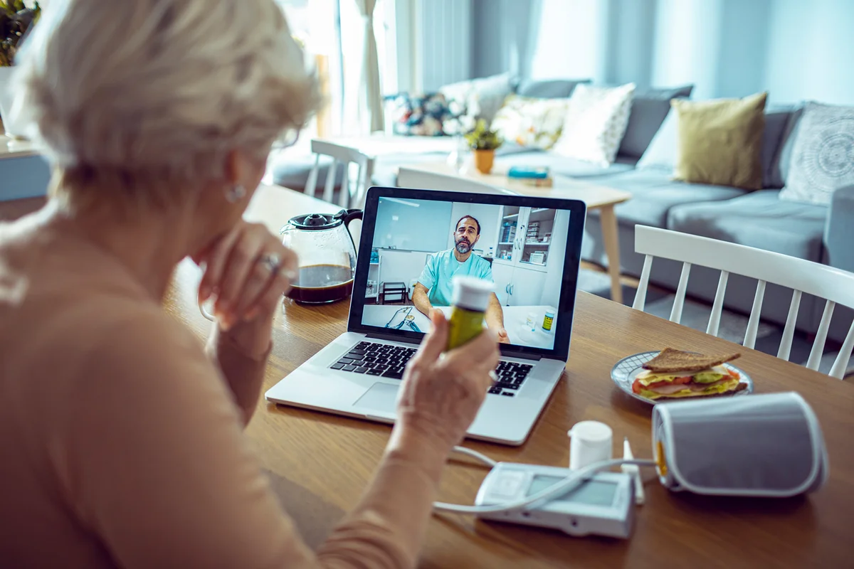 Senior Woman consulting with doctor online