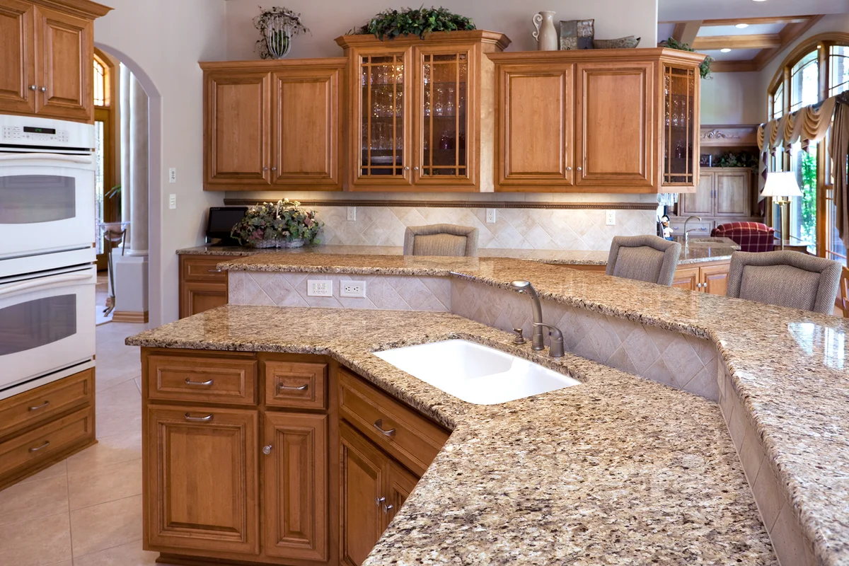 Luxury Eat-In Kitchen With Granite Counters, Oak Cabinets