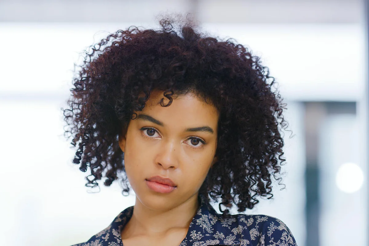 serious looking young woman