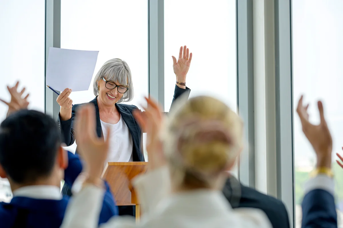 Senior woman giving retirement speech