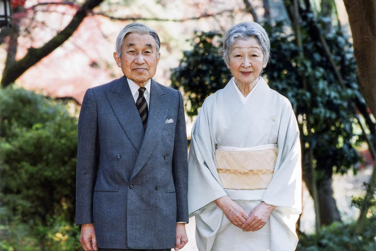 Emperor Akihito and Empress Michiko stand together by Sokintei arbor | Getty Editorial Use