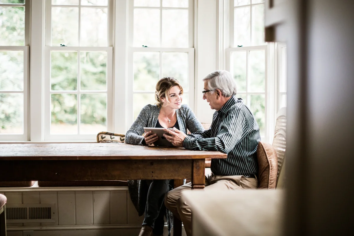 Father and daughter using tablet
