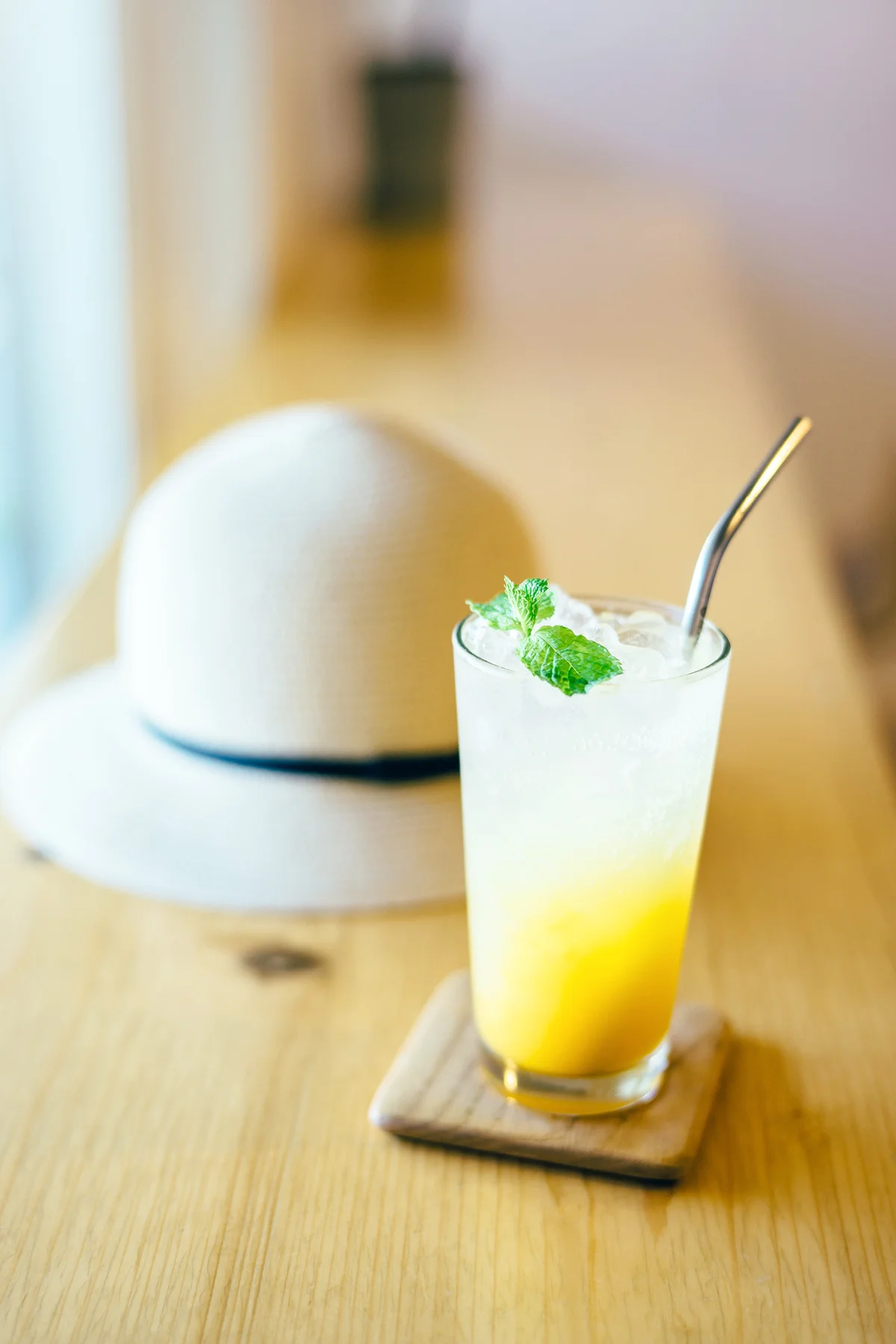 A glass of refreshing iced passion fruit and mango lemonade