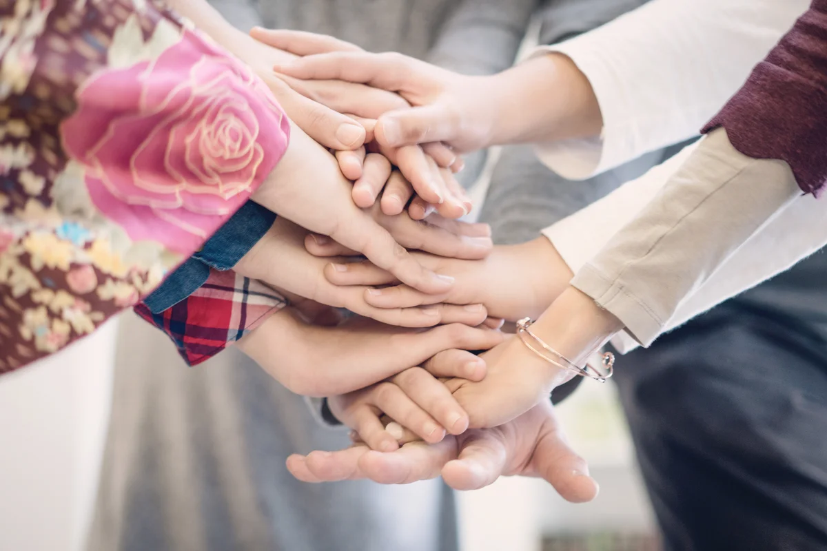Hands together in circle