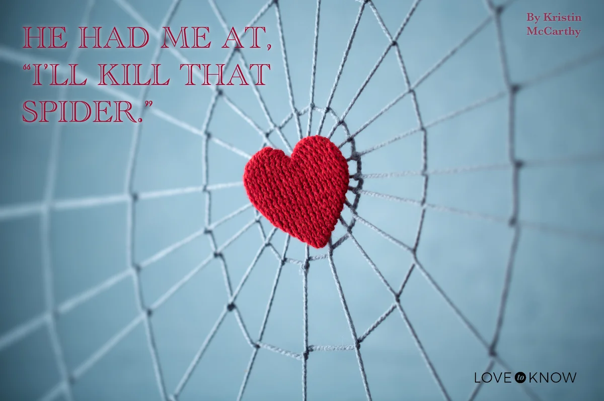 Red knitted heart in the center of the knitted web