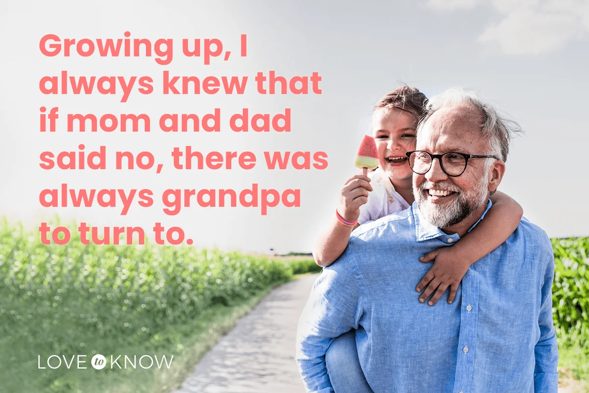 Grandfather carrying granddaughter piggyback