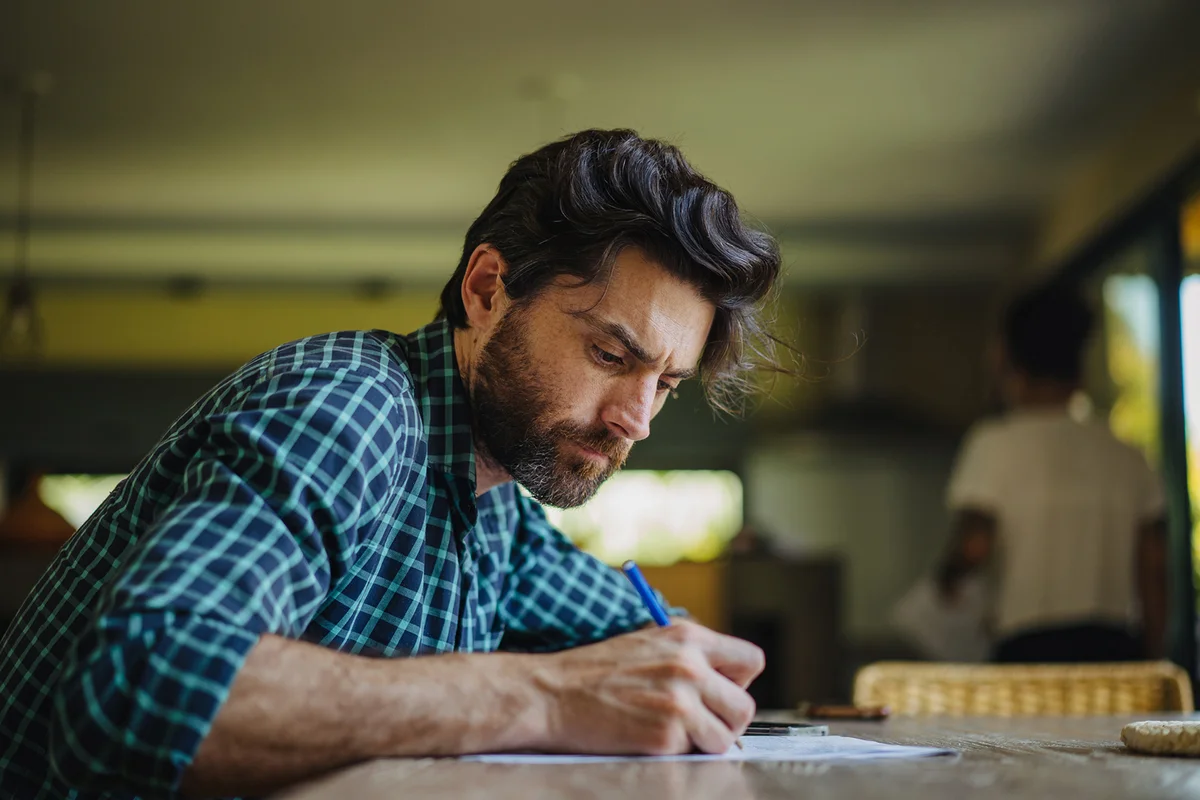 Man writing letter