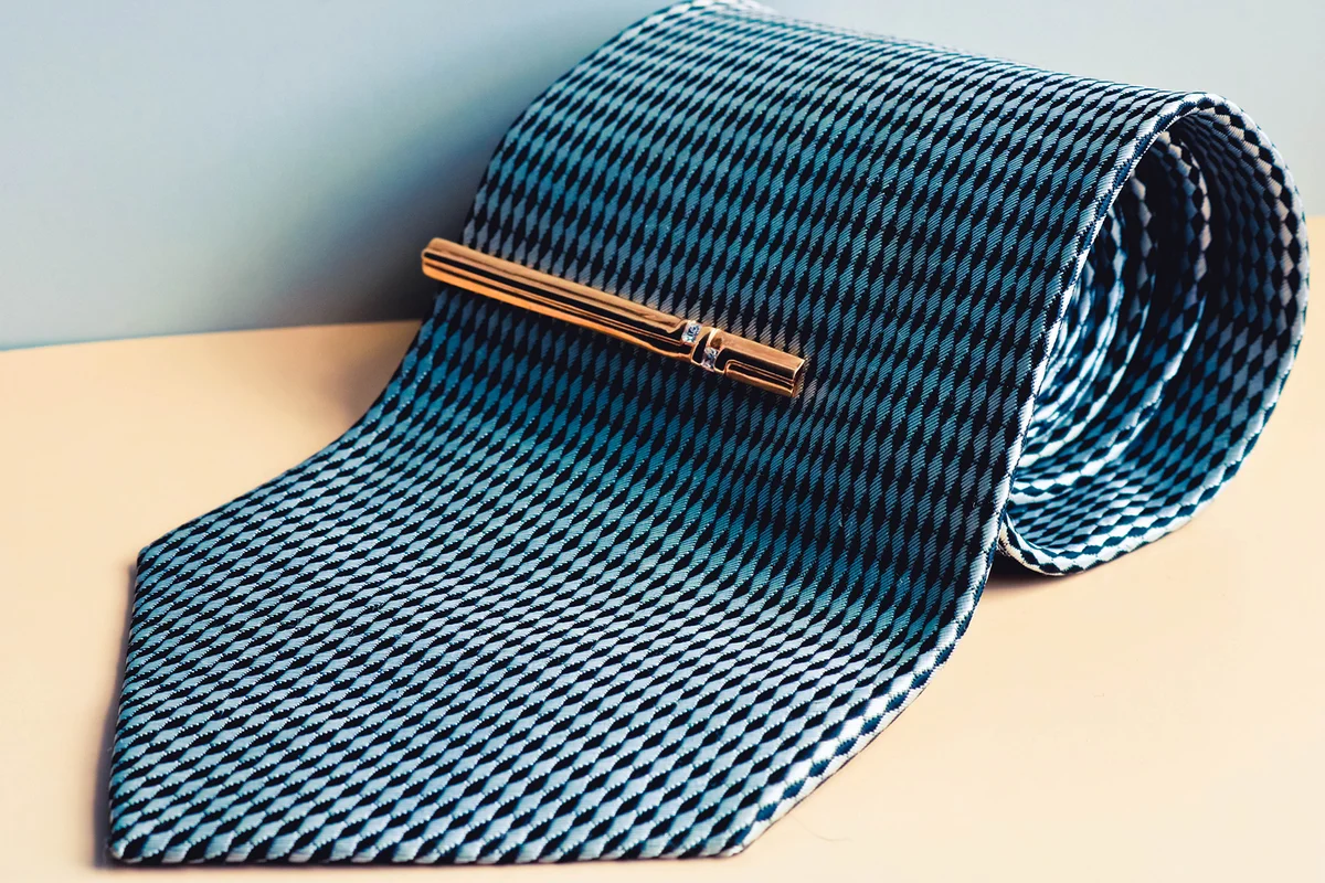 Tie roll with golden tie clip
