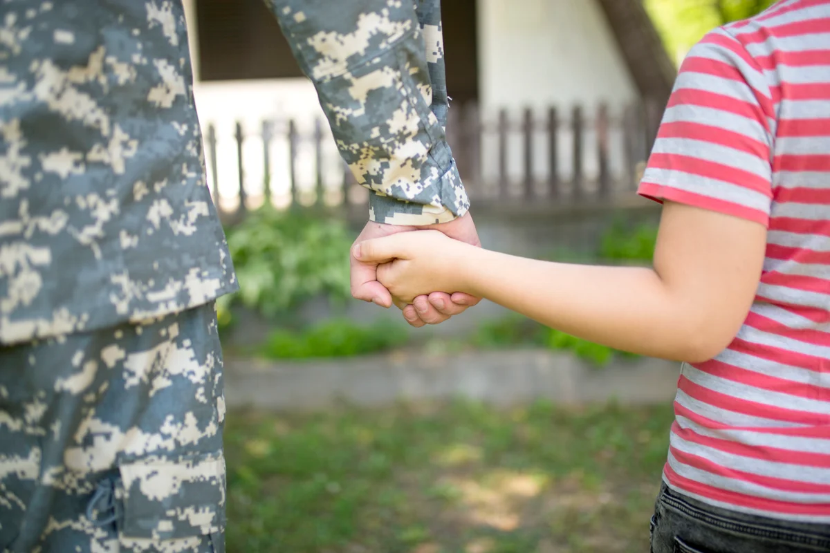 Military father and child together