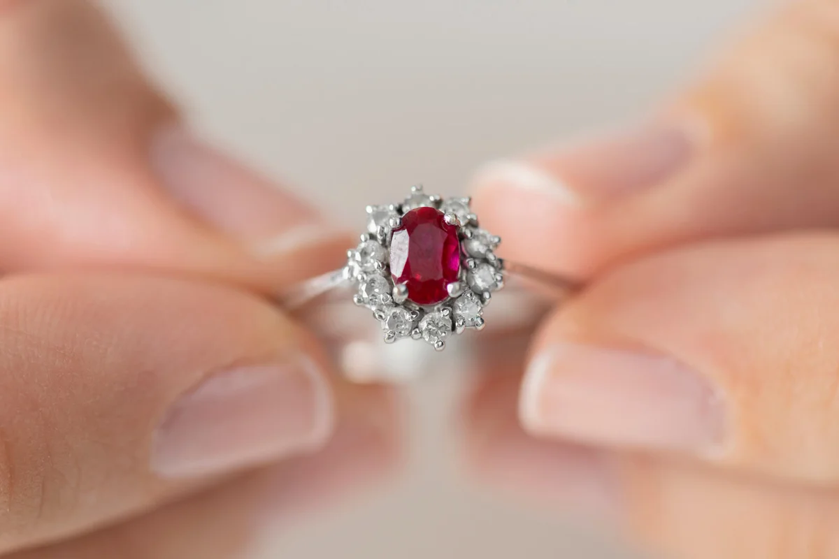 Woman Holding a Diamond Ring