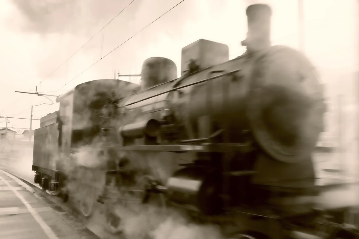 An old train leaving the station