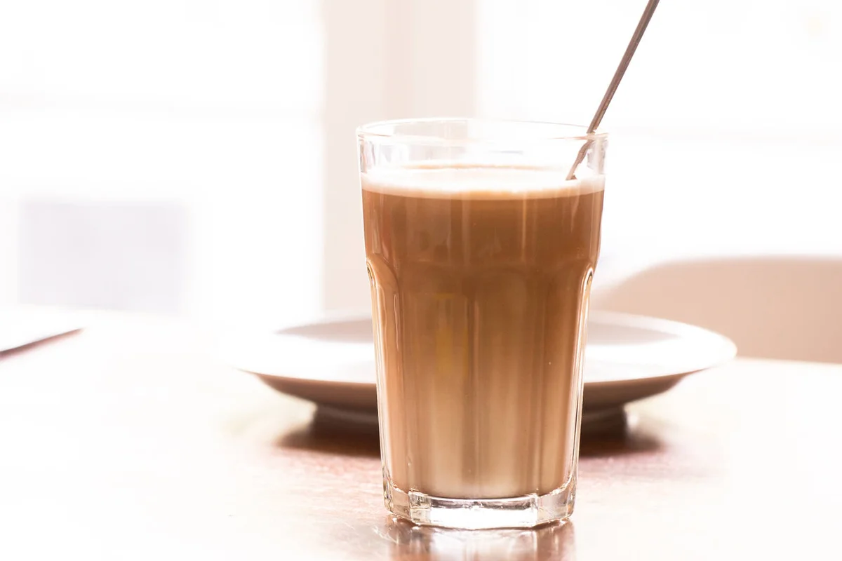 A milk coffee in front of high key background