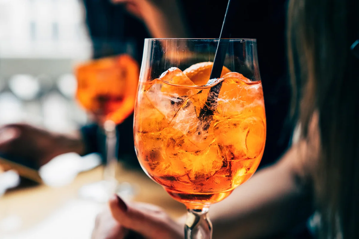 Two women with Spritz drinks