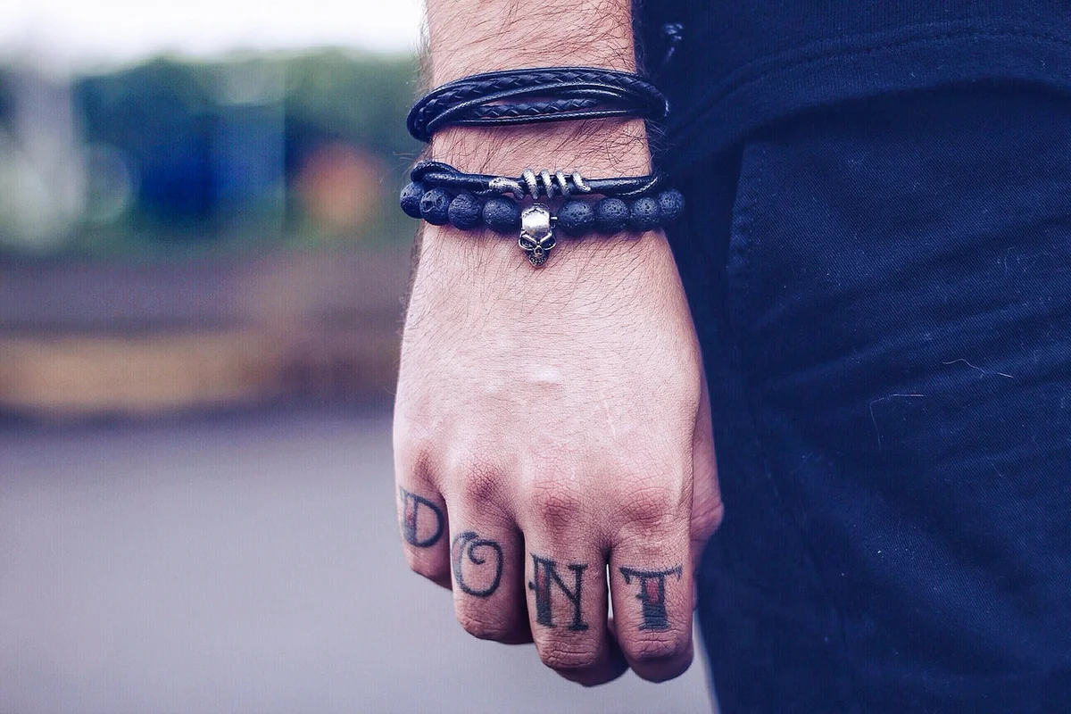 Cropped Hand Of Man With Tattoo