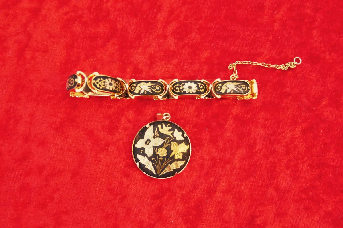 Toledo intarsia jewellery on red velvet