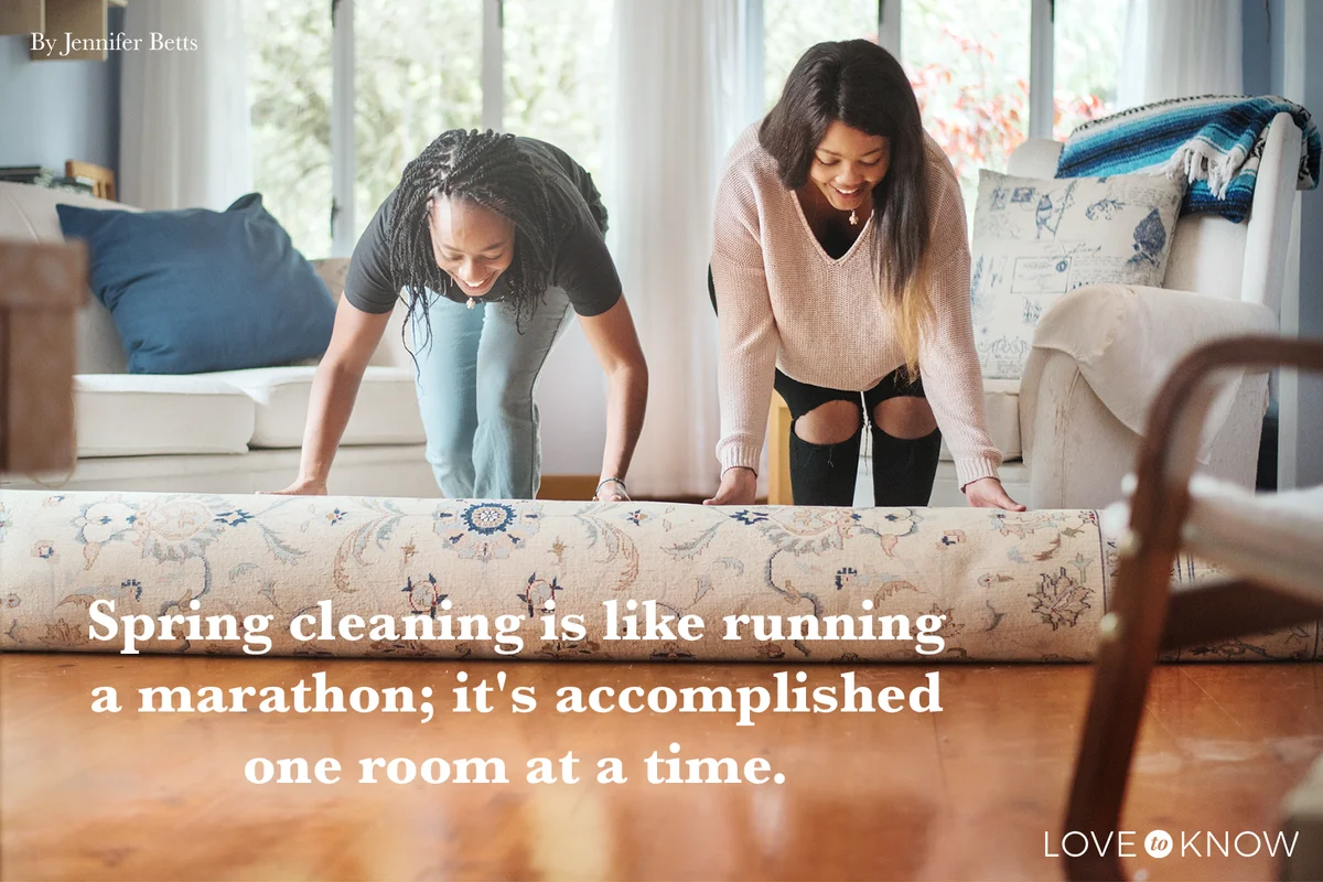 two women unrolling carpet