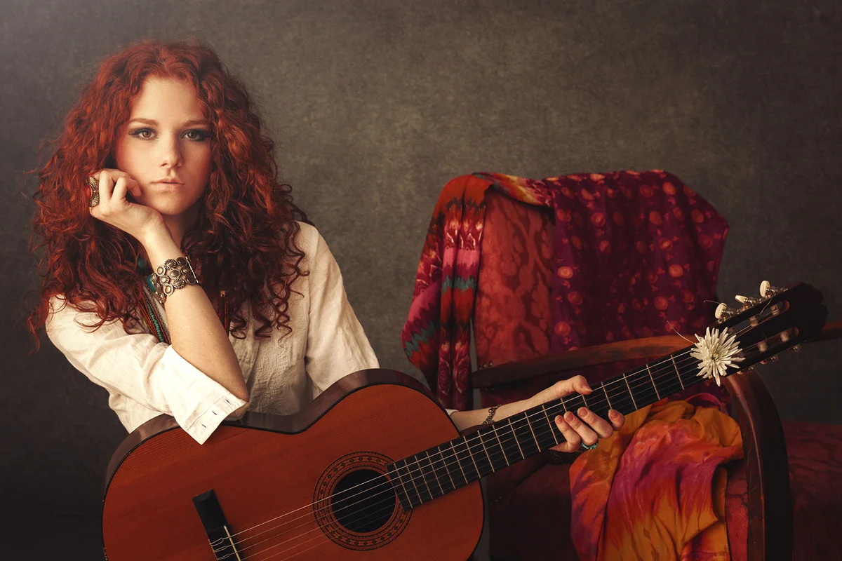 Girl with acoustic guitar