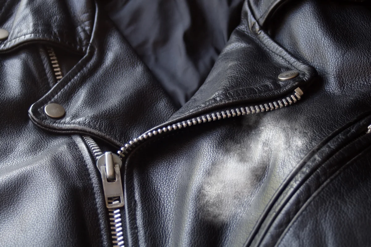 Stained Black Leather Motorcycle Jacket