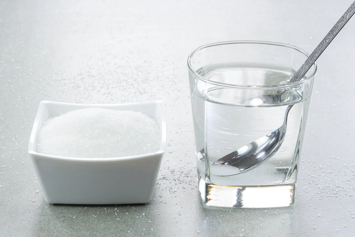 Sugar water in a glass cup