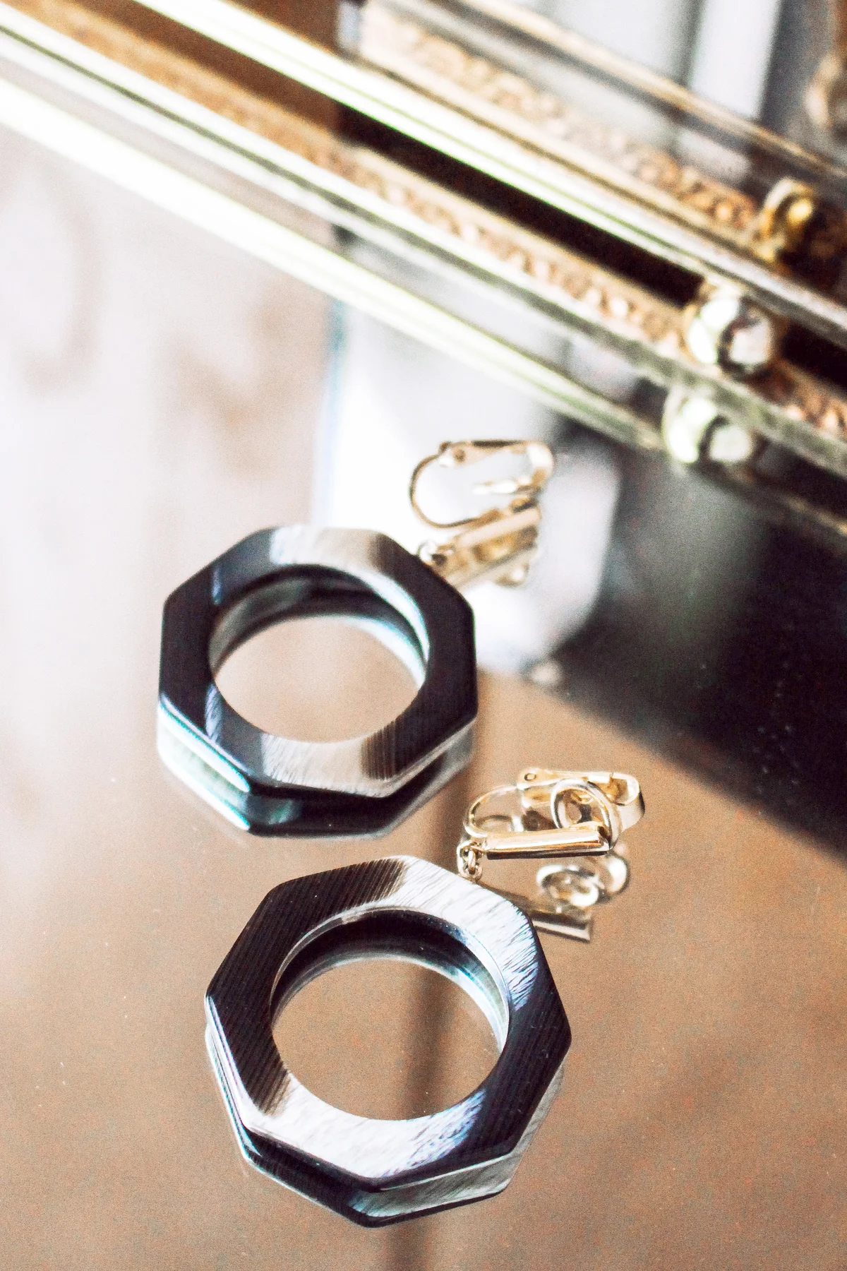 Fashionable Earrings On Mirror Tray