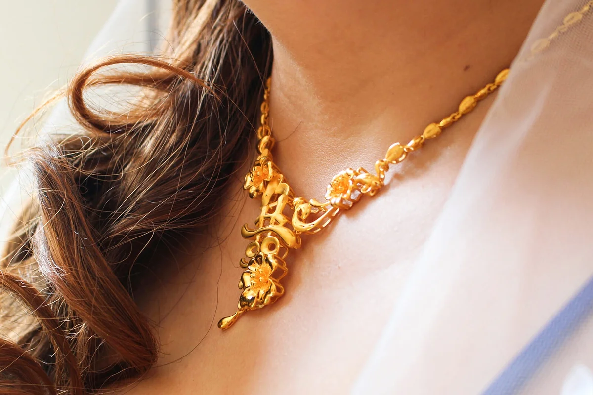 Midsection Of Bride Wearing Gold Necklace