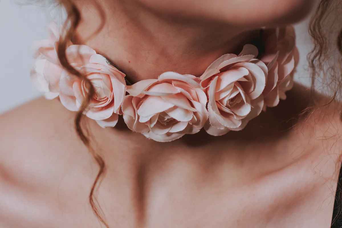 Woman Wearing Flower Necklace