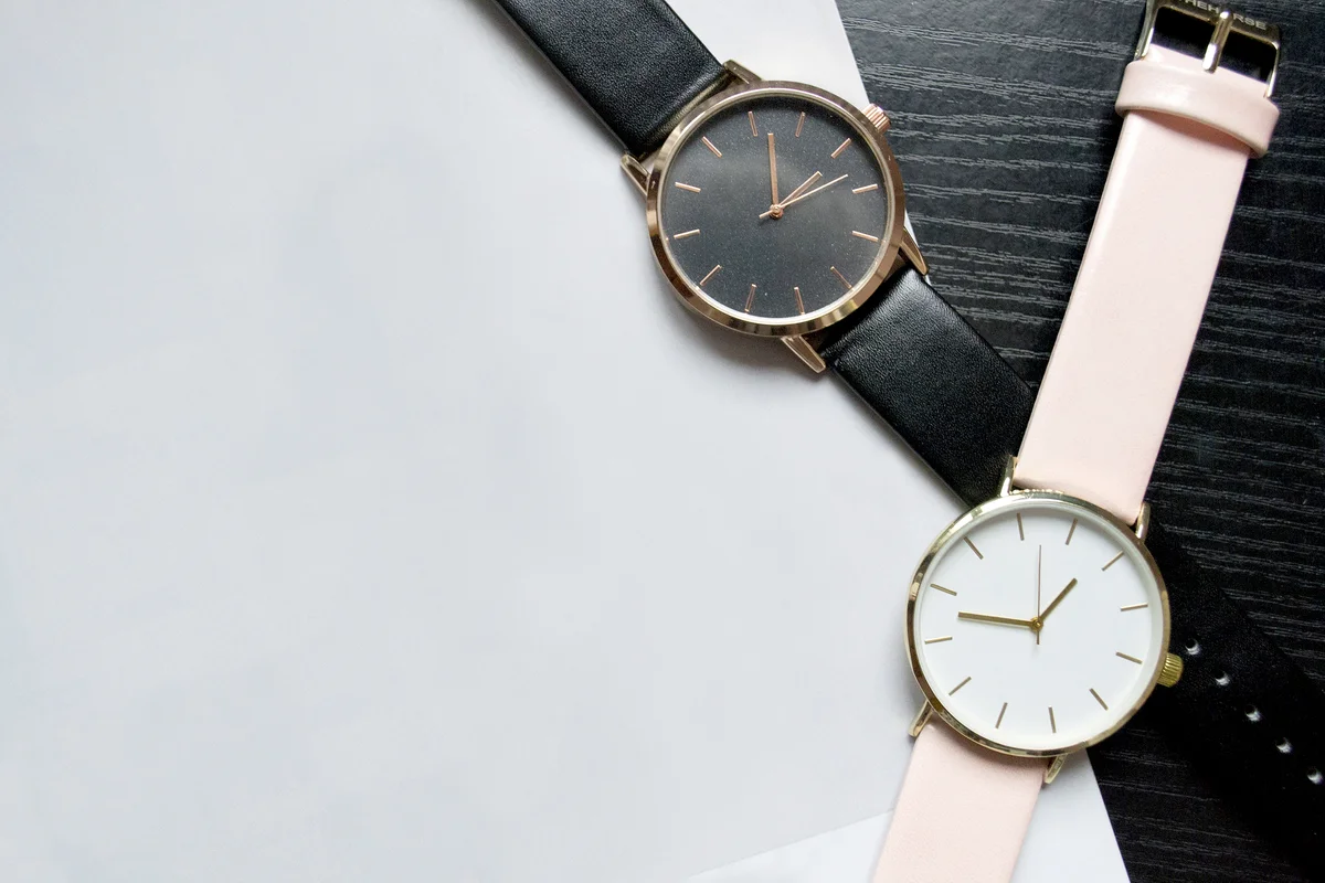 Two watches black and pink