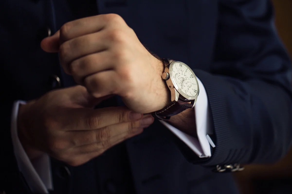 Man wearing suit with nice watch