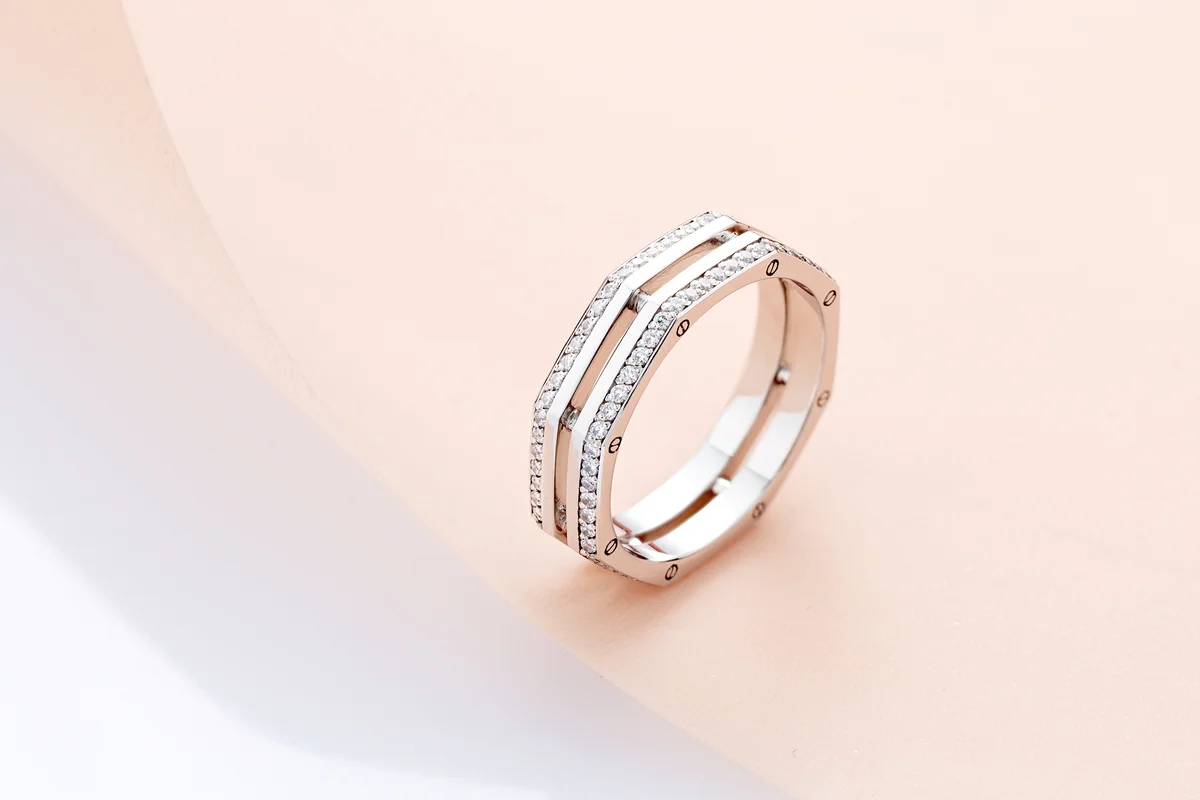 White gold screw nut shape wedding ring with diamonds