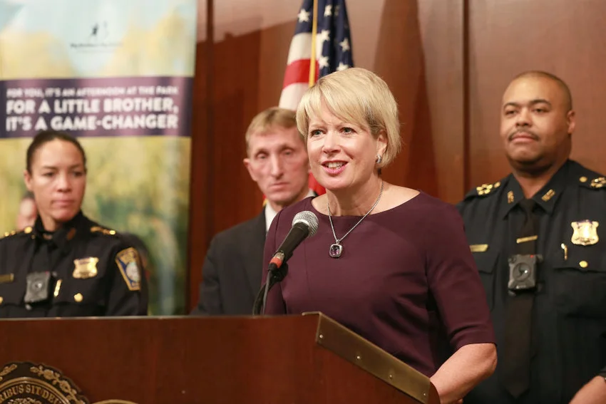 Wendy Foster, president and CEO of Big Brothers Big Sisters of Massachusetts Bay speaks at a press conference