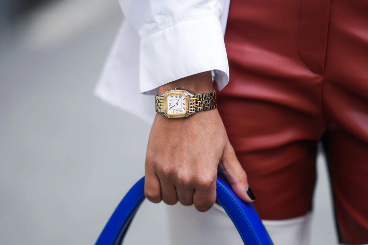 Melanie Darmon wears a golden and silver watch from Cartier | Getty Editorial Use