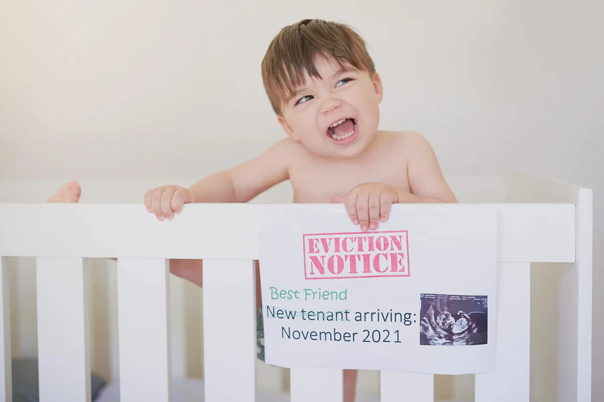 Shot of an unhappy baby boy crying while standing in his crib
