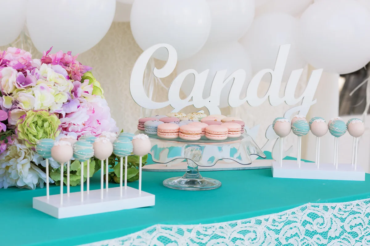 Cute candy bar with various candies and cakes