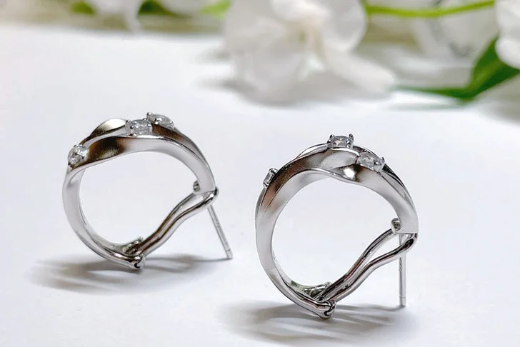 Italian Style sterling silver cubic zirconia wave design french clip earring