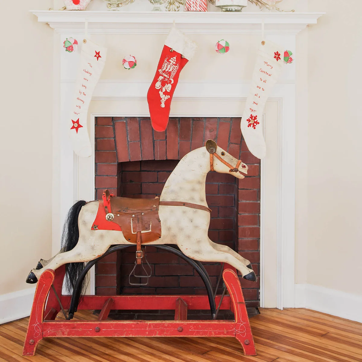 Christmas fireplace display with rocking horse