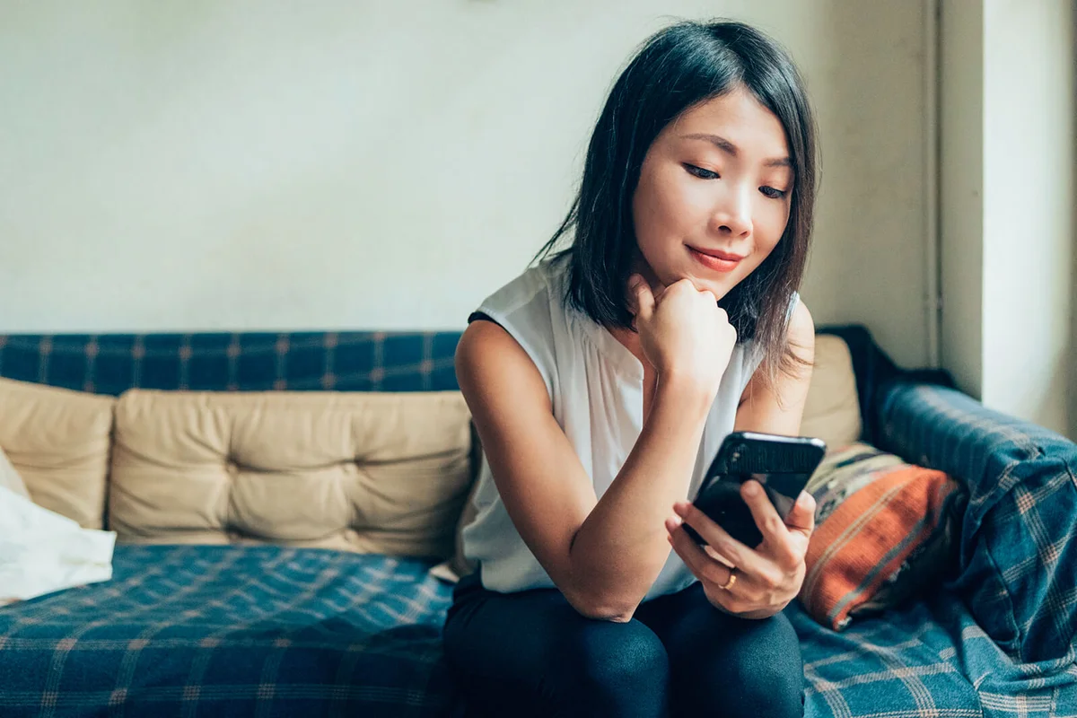 woman using smartphone