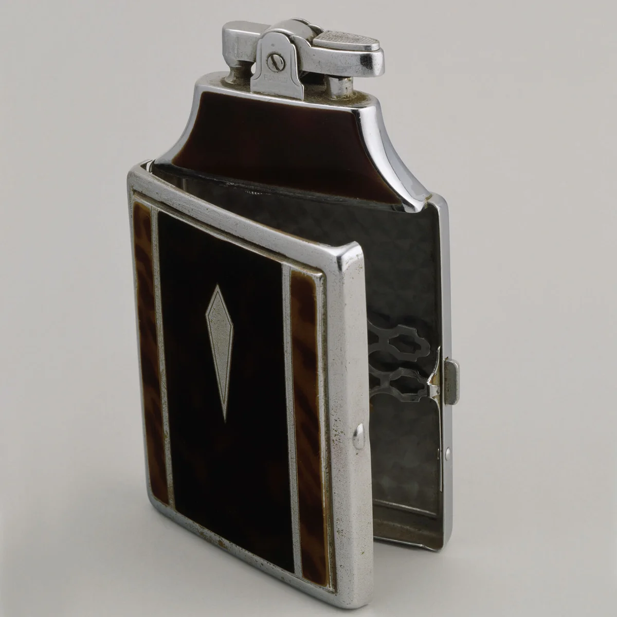 Ronson lighter with a cigarette case. United States of America, 20th century | Getty Editorial Use