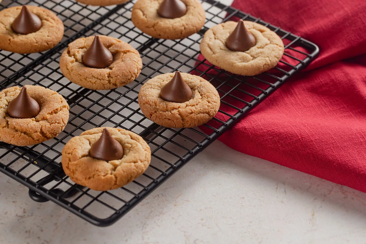 Classic Peanut Butter Blossom Cookies on a Kitchen Counter